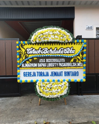 Papan Bunga Duka di Binuang